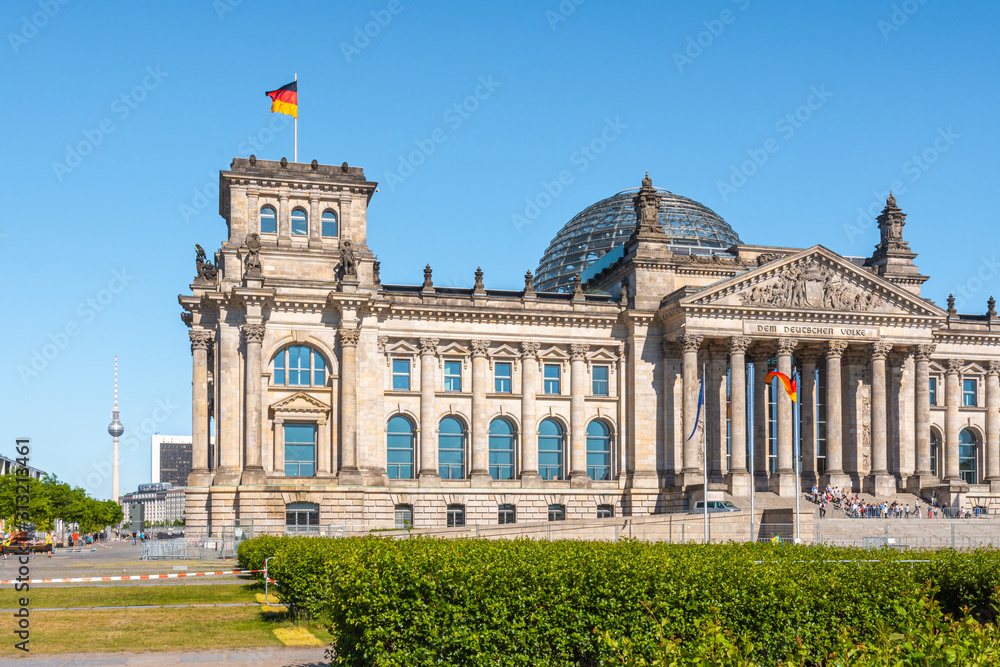 Reichstag Building in Berlin with a view of the Berliner Fernsehturm (Berlin TV Tower) in the background