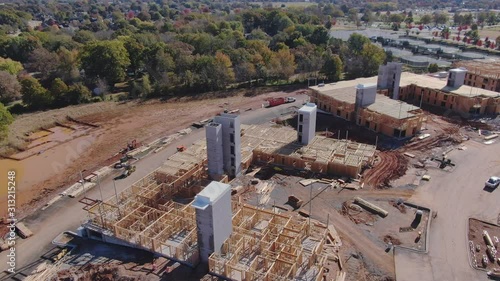 aerial view of apartment complex construction photo