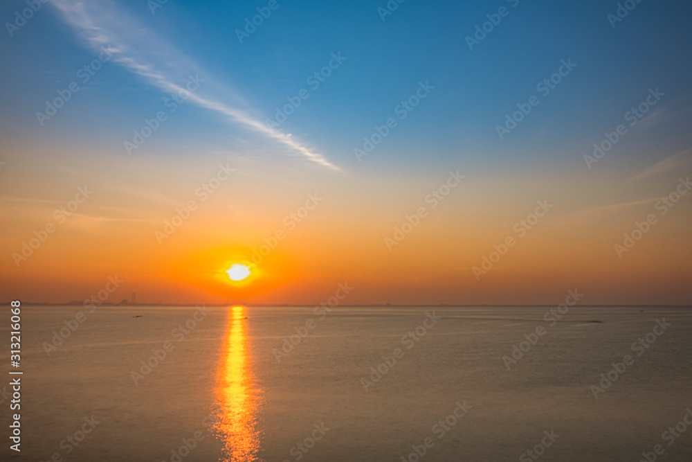 Sun rising in the horizon of the tropical sea