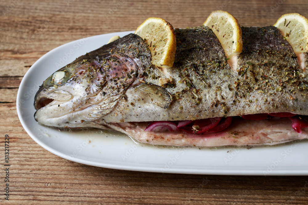 Baked rainbow trout with lemon. Baked rainbow trout with lemon.