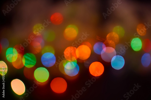 Color Blurry bokeh on a dark background © Leonid _Maliarevskyi