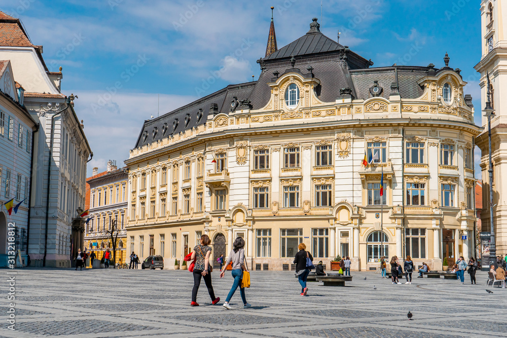 Piata Mare . The main sqaure in the old town of  Sibiu during spring season . One of the most beautiful city which is Unesco sites of the country , Sibiu , Transylvania , Romania