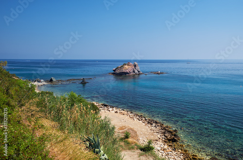 The view of the blue Takkas bay with Aphrodite's Rock. Akamas Peninsula. Cyprus