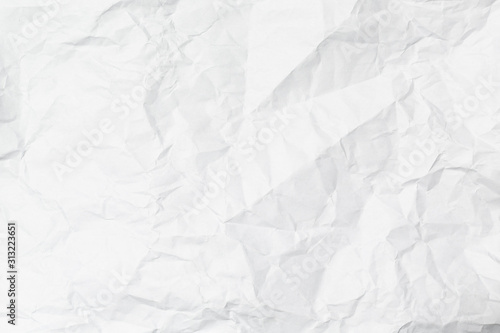 A white crumpled paper texture overlay background