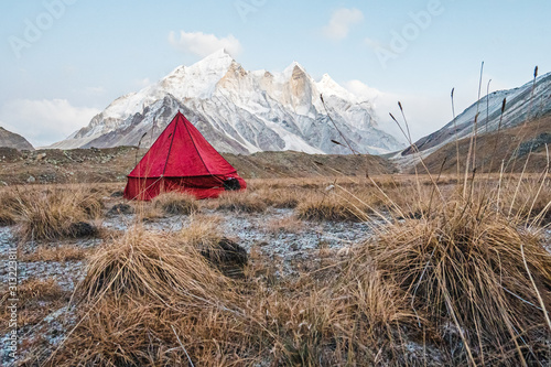 Gangotri National Sanctuary, Uttarakhand, India, red tent at Tapovan, an important place in Hindu mythology, in the backdrop the Bhagirathi Group photo