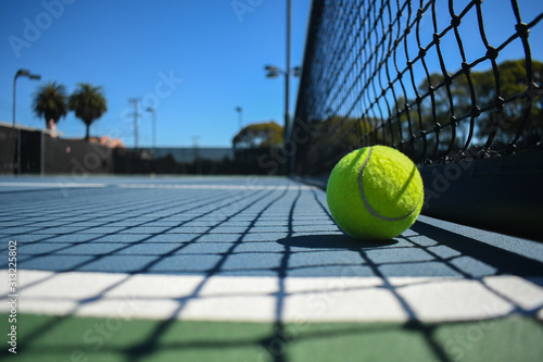 tennis ball on court © Zara