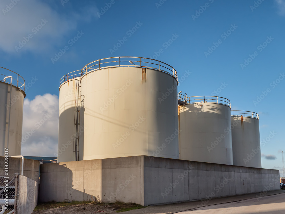 Fish oil tanks on Thyboroen harbor, Denmark Fish oil tanks on Thyboroen harbor, Denmark