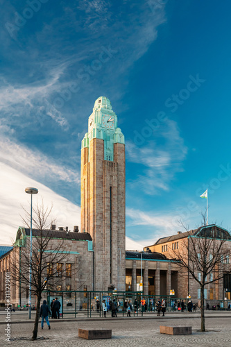 Helsinki, Finland. View Of Helsinki Central Railway Station In Sunny Winter Day. The Station Building Was Designed By Eliel Saarinen photo