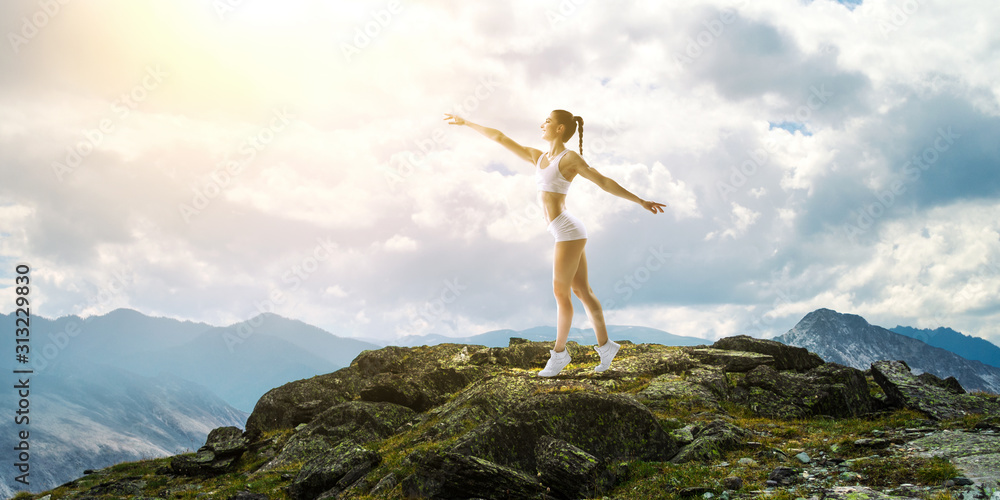 Athlete woman outdoors. Mixed media Athlete woman outdoors. Mixed media