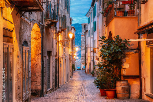 Terracina, Italy. Night Evening View Of Old Street In Illuminations