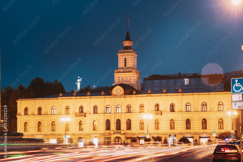 Tbilisi, Georgia. Tbilisi City Hall In Freedom Square In City Center. Clock-towered Edifice. It Houses The Mayor s Office And City Assembly. Famous Landmark In Night Lighting
