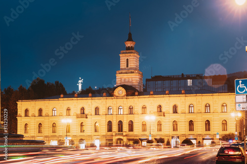 Tbilisi, Georgia. Tbilisi City Hall In Freedom Square In City Center. Clock-towered Edifice. It Houses The Mayor s Office And City Assembly. Famous Landmark In Night Lighting photo