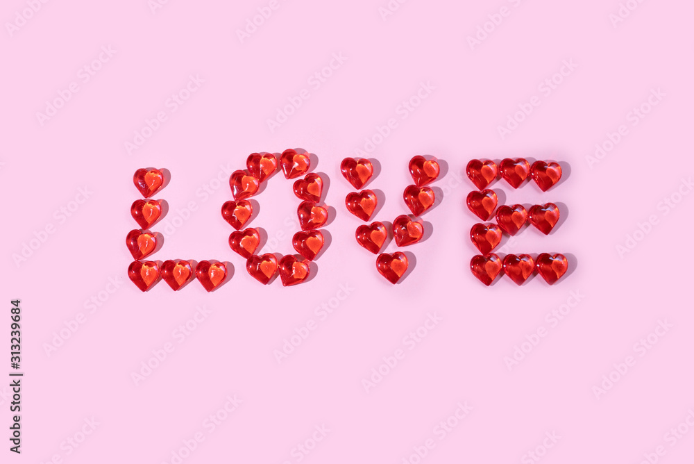 Background for Valentine's Day, love from glass hearts, hard light, minimalism. Background for Valentine's Day, love from glass hearts, hard light, minimalism.