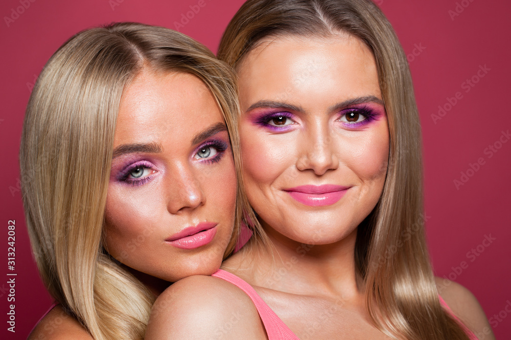Two happy beautiful women close up portrait Two happy beautiful women close up portrait
