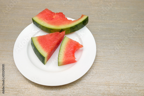 Slices of watermelon on a table