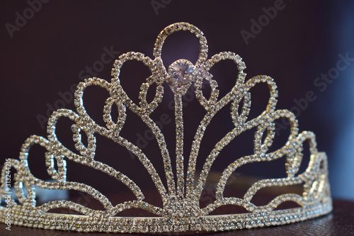 Crown set with diamonds On a beautiful leather floor