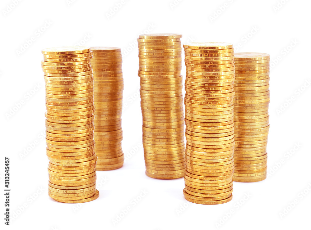 Stacks of gold coins isolated on white background. Stacks of gold coins isolated on white background.