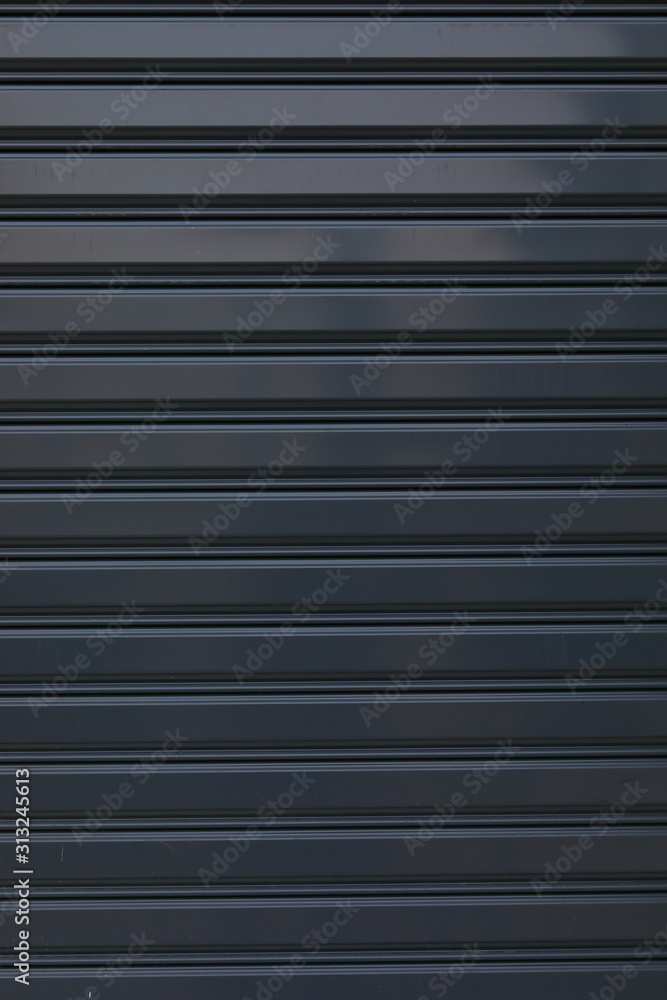 black roller shutter door closed security background black roller shutter door closed security background