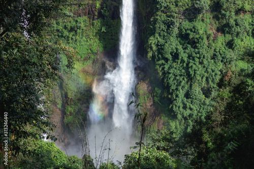 Beautiful Waterfall among the Green Forest and Rainbow from below in Paksong District Champasak Province Laos