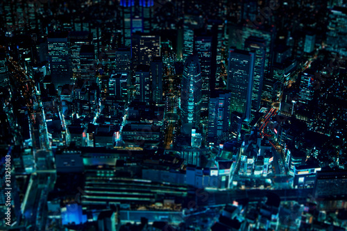 urban cityscape at night, view from drone