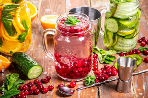 Variety of infused detox water. health concept photo