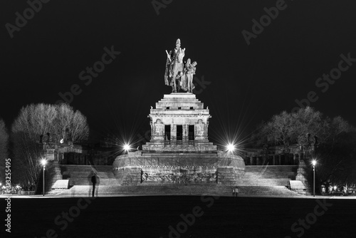Night view of monumental equestrian statue of William I, the first German Emperor.,at German Corner, German: Deutsches Eck. Confluence of rivers Mosel and Rhine, Germany