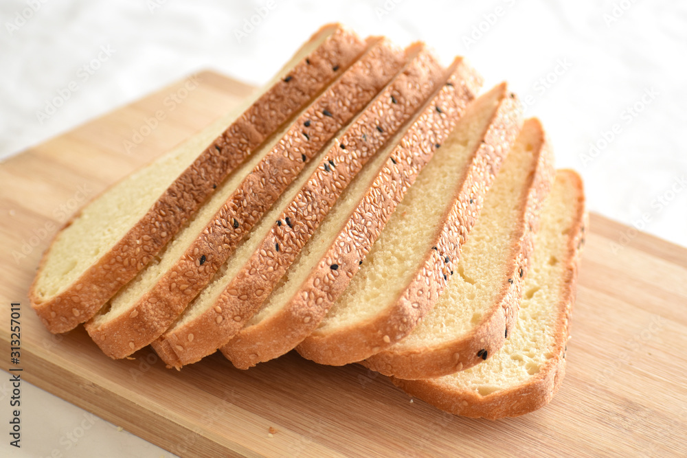 Multigrain bread on a chopping board. Selective focus. Multigrain bread on a chopping board. Selective focus.