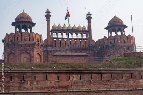 Striking view of the outside of Red Fort in Delhi India, with the India flag waving