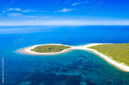 Croatia, Adriatic seascape, rocky cape in turquoise sea, clear blue water on the island of Dugi Otok