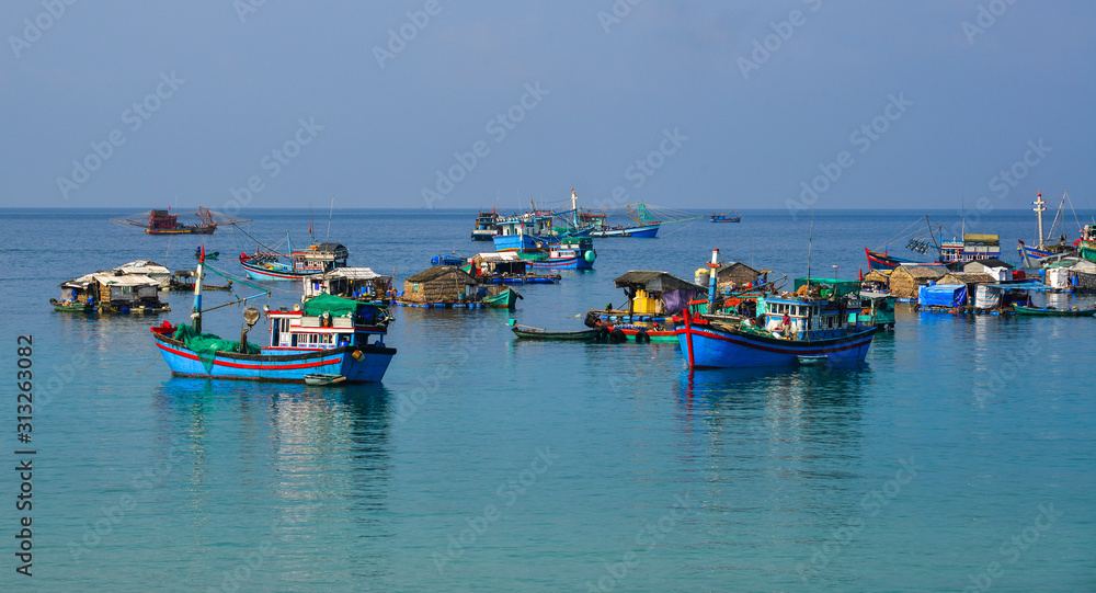 Fishing boats on the blue sea Fishing boats on the blue sea