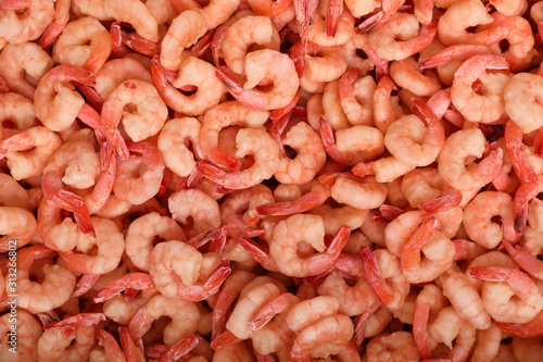 Fototapeta Naklejka Na Ścianę i Meble -  Fresh raw shrimps as background, top view. Wholesale market