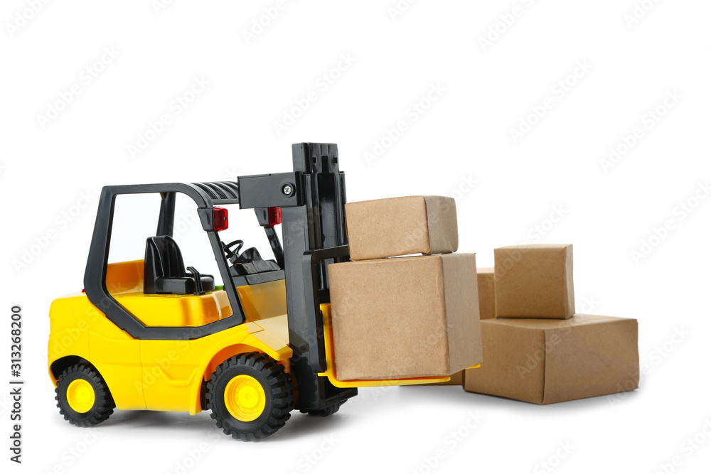 Toy forklift with boxes isolated on white. Logistics and wholesale concept