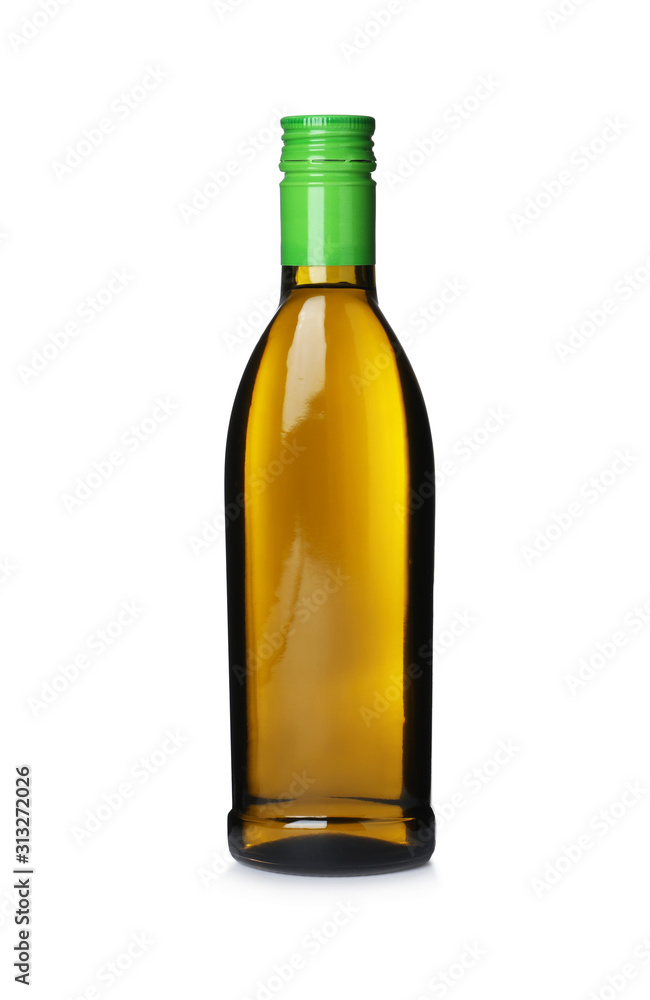 Cooking oil in glass bottle isolated on white Cooking oil in glass bottle isolated on white