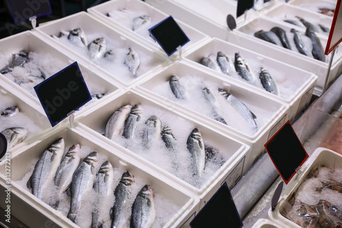 Photography Fresh fish on display with ice at wholesale market