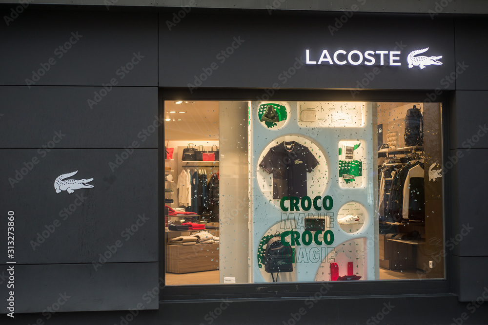 Mulhouse - France - 4 January 2020 - front view of Lacoste Store, Lacoste  is the famous french brand of sport wear Stock Photo | Adobe Stock