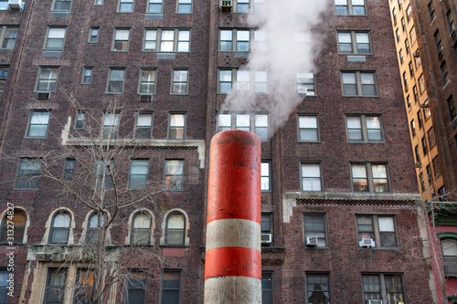 Bild auf Leinwand Orange Steam Pipe in Midtown Manhattan of New York City