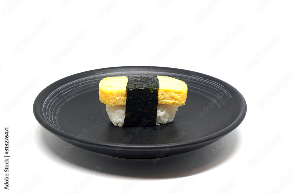 Japanese Food - salmon sushi on black plate isolated on white background - aerial view Japanese Food - salmon sushi on black plate isolated on white background - aerial view