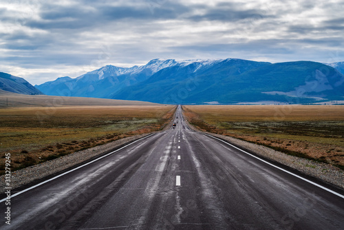 Chuysky tract at dawn, landscape with a highway. Russia, mountain Altai