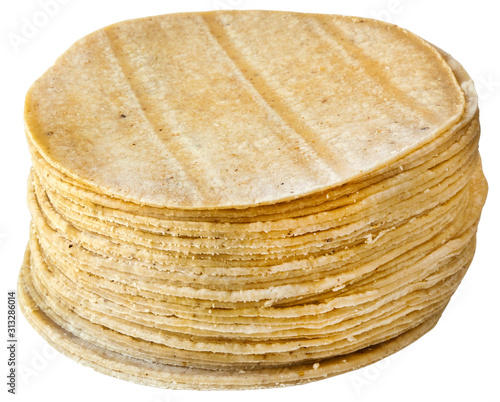 Isolated stack of yellow corn tortillas. photo