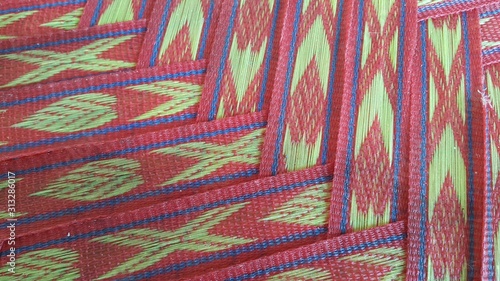 Closeup view of colorful plastic woven stripes.