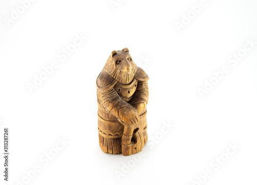 Figurine wooden bear with an ax. Wood carving. Handmade.
