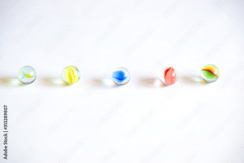 Colorful glass balls and white background Colorful glass balls and white background
