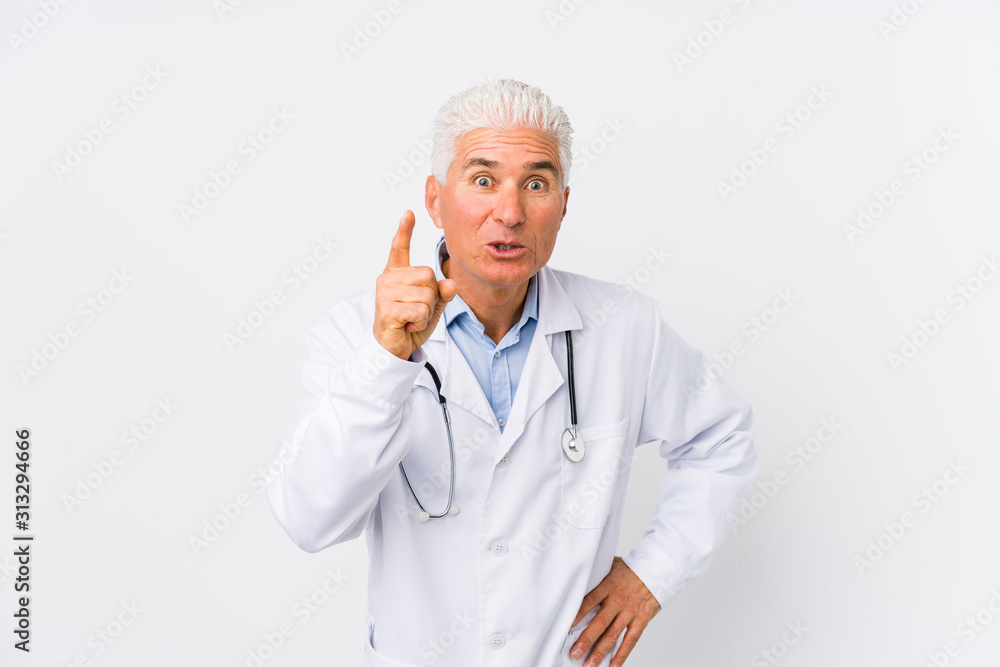 Mature caucasian doctor man having an idea, inspiration concept. Mature caucasian doctor man having an idea, inspiration concept.