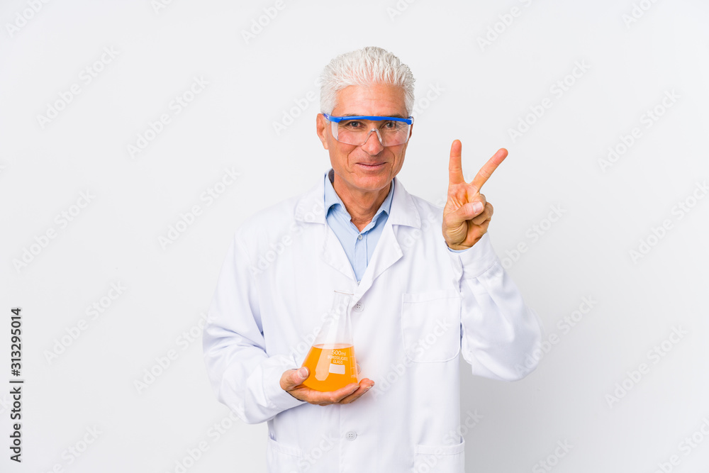 Mature chemical man isolated showing number two with fingers. Mature chemical man isolated showing number two with fingers.