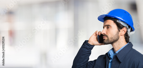 Engineer using a mobile phone