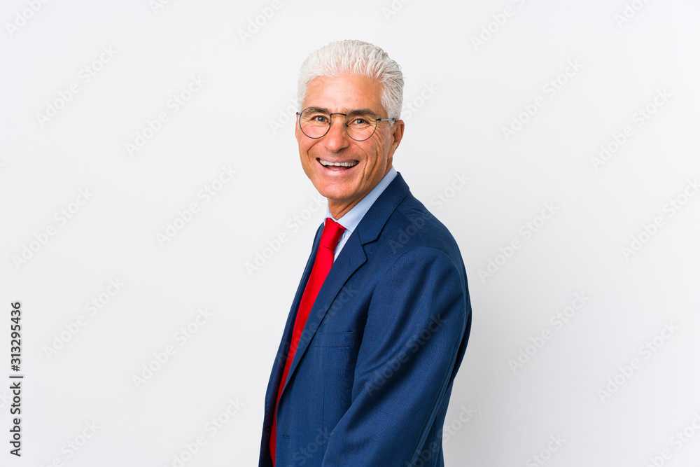 Middle aged caucasian business man isolated looks aside smiling, cheerful and pleasant. Middle aged caucasian business man isolated looks aside smiling, cheerful and pleasant.