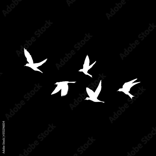 Silhouette of flying birds on black background. Inspirational body flash tattoo ink. Vector.