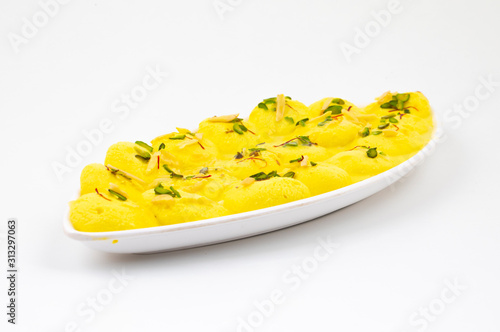 Indian Traditional Special Dessert Ras Malai Also Know as Rasmalai or Rossomalai on White Background photo