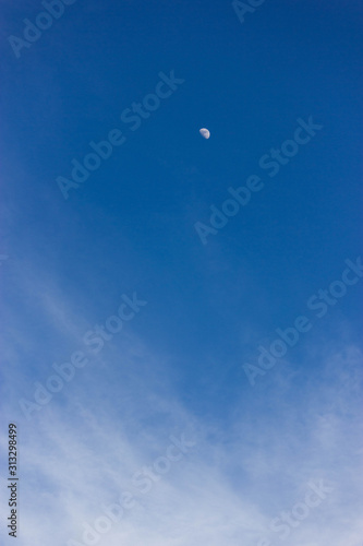 Moon in a blue sky