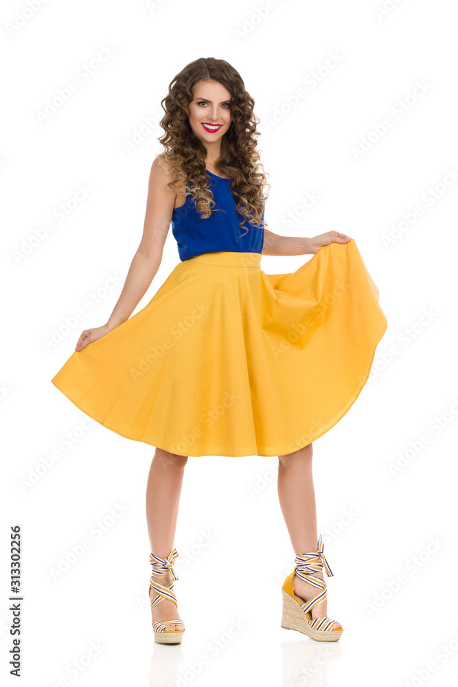 Beautiful Woman Is Presenting Her Yellow Circle Cut Skirt. Beautiful Woman Is Presenting Her Yellow Circle Cut Skirt.